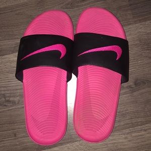Pink and black Nike Slides